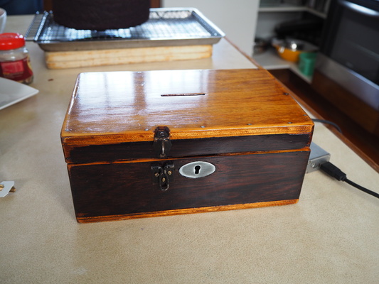 A photo of the final box cleaned and varnished